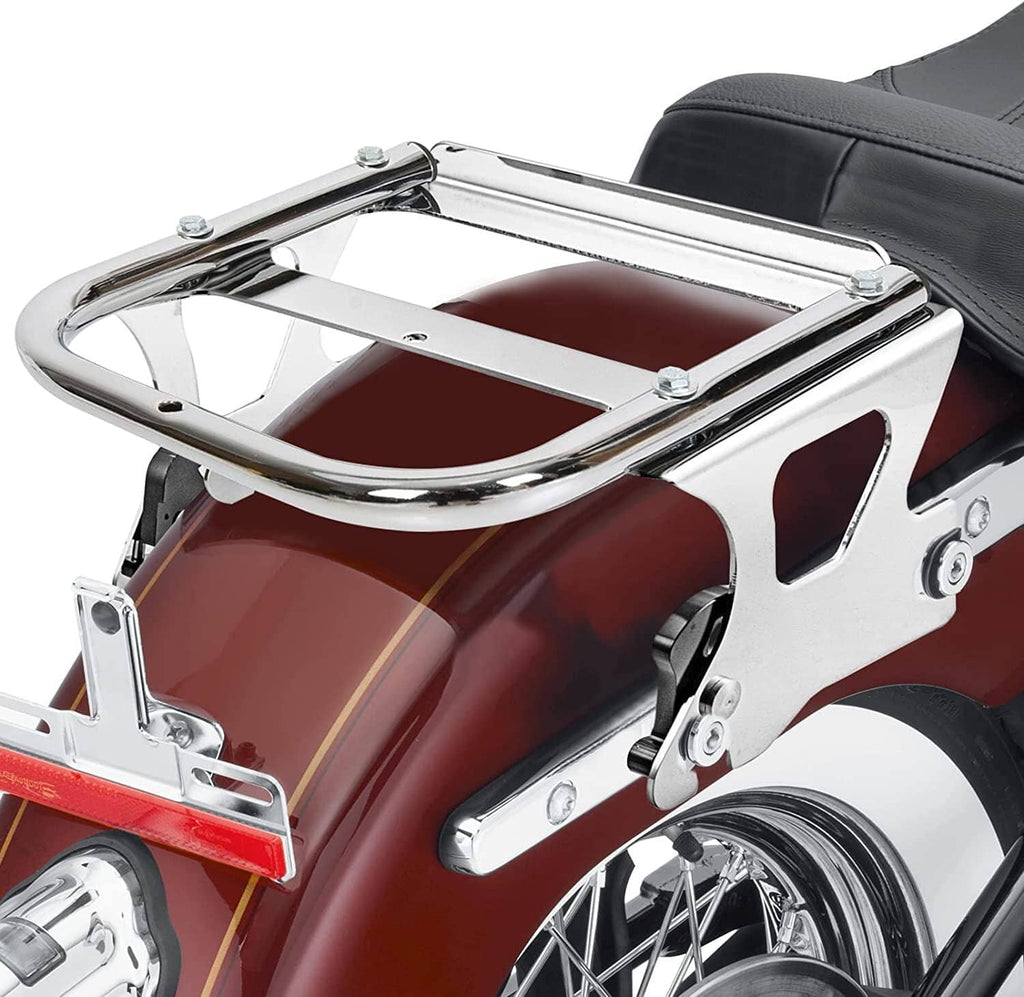 Chrome luggage rack with rear docking frame over a motorcycle seat area