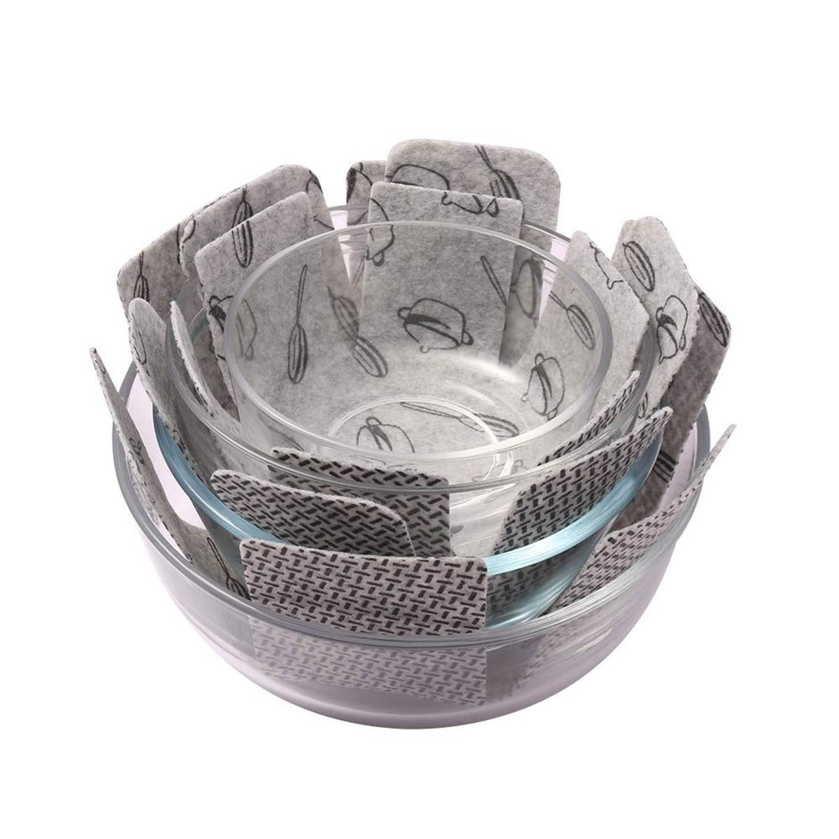 Gray utensil-pattern pot and pan protectors, nested inside a glass bowl