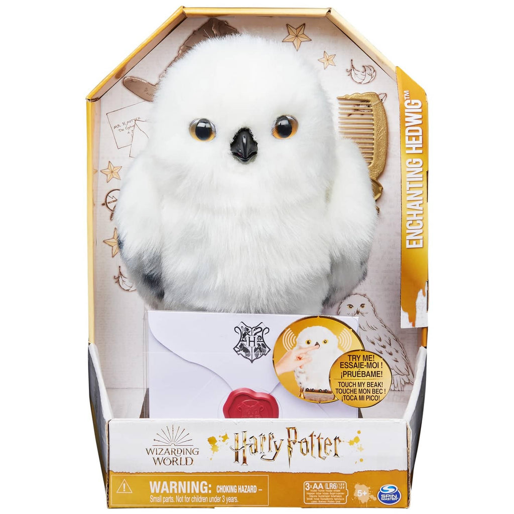 White interactive owl plush in a wizard-themed gift box with Enchanting Hedwig branding.