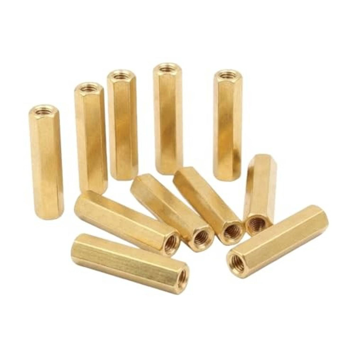 Multiple long brass hex nuts with internal female threads, hex openings visible