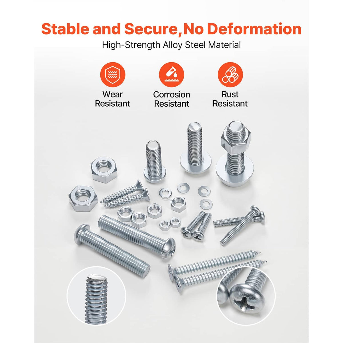 Assorted alloy steel bolts and hex nuts laid out on a light surface