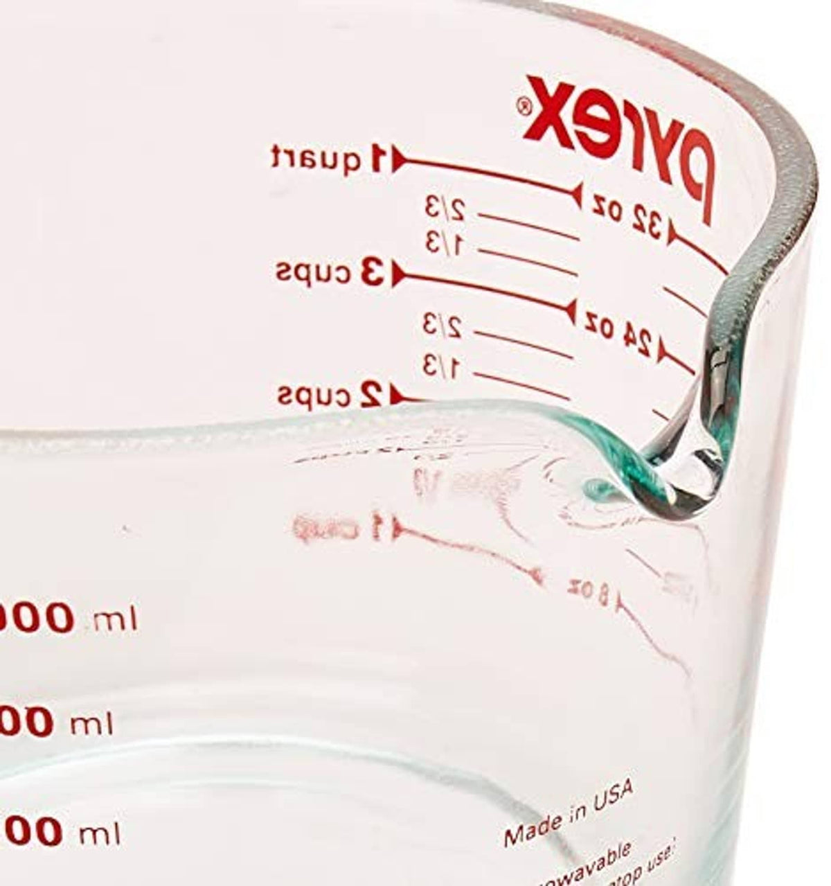 Pyrex glass measuring cup spout and handle with red measurement scale on side