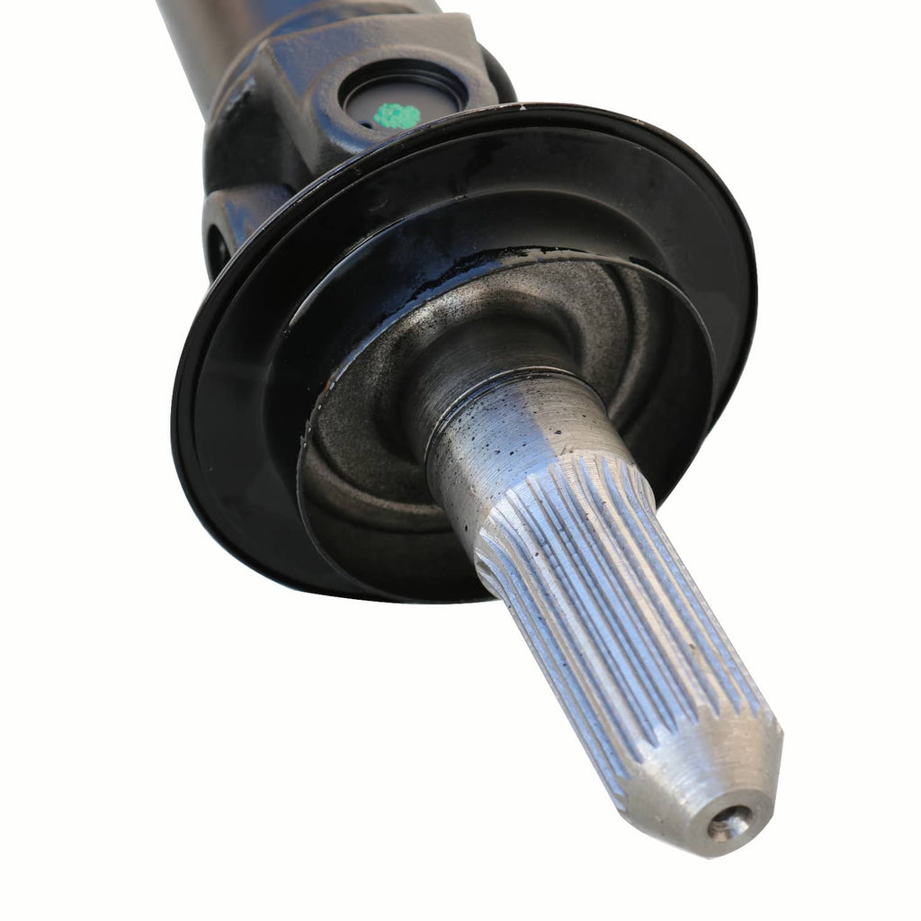 Front drive shaft joint end with black circular housing and ridged splined shaft