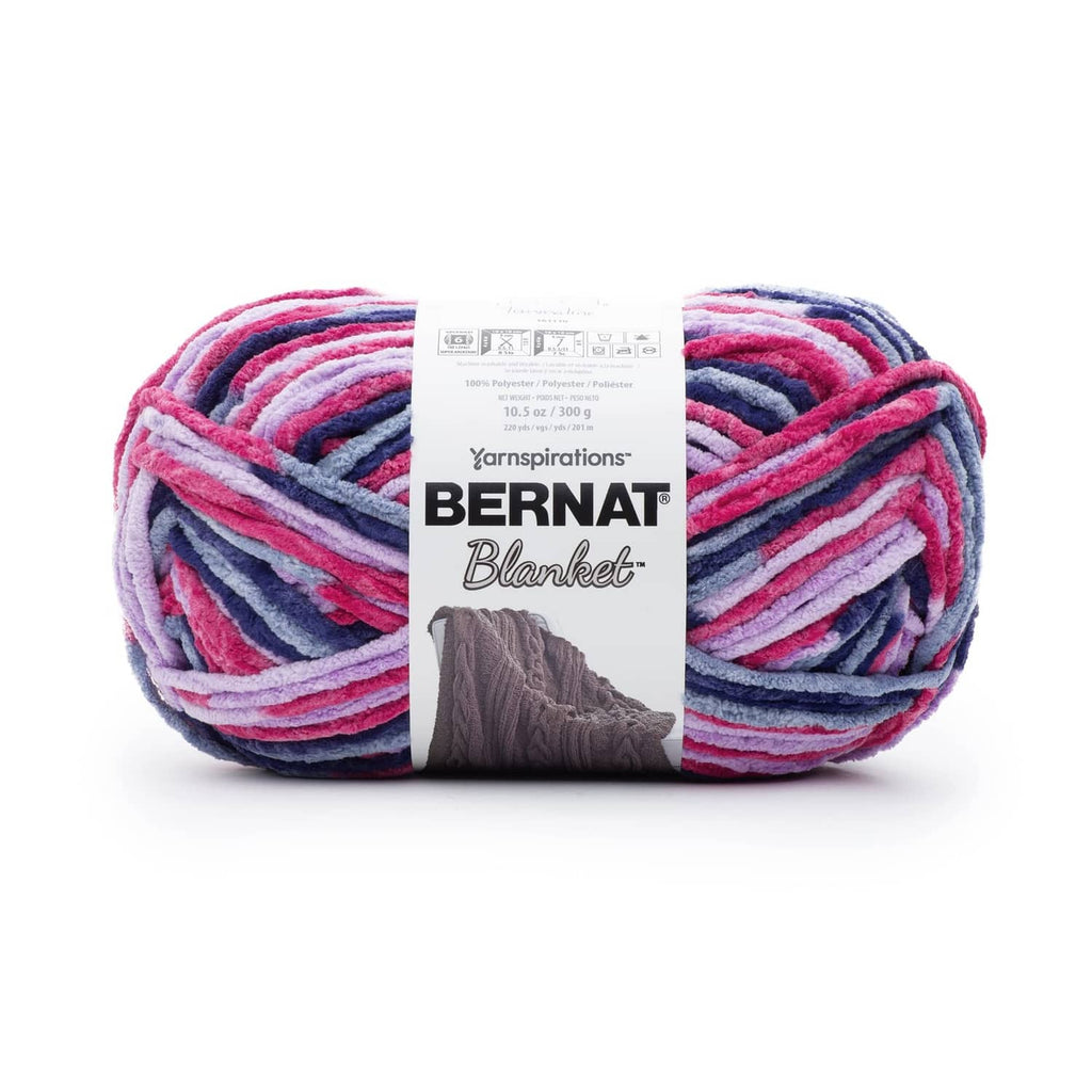 Super bulky chenille yarn skein, striped pink blue purple with Bernat Blanket label