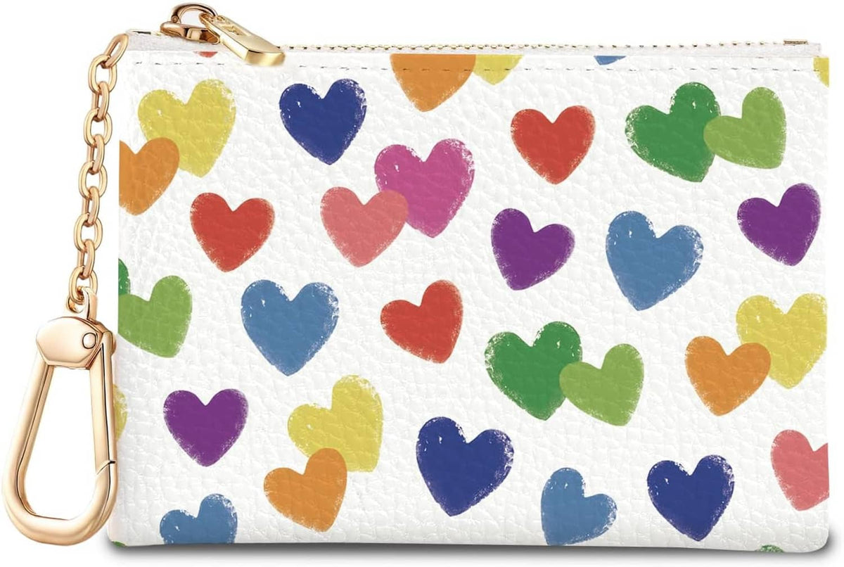 Heart-print mini change pouch with gold zipper and keychain, white textured PU.