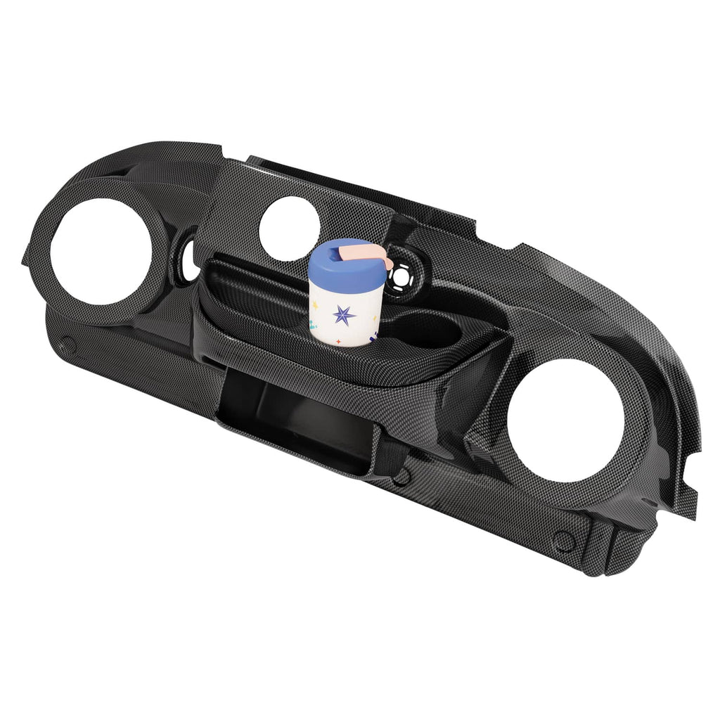 Black carbon fiber dash cover with two speaker openings, central radio recess, and storage tray