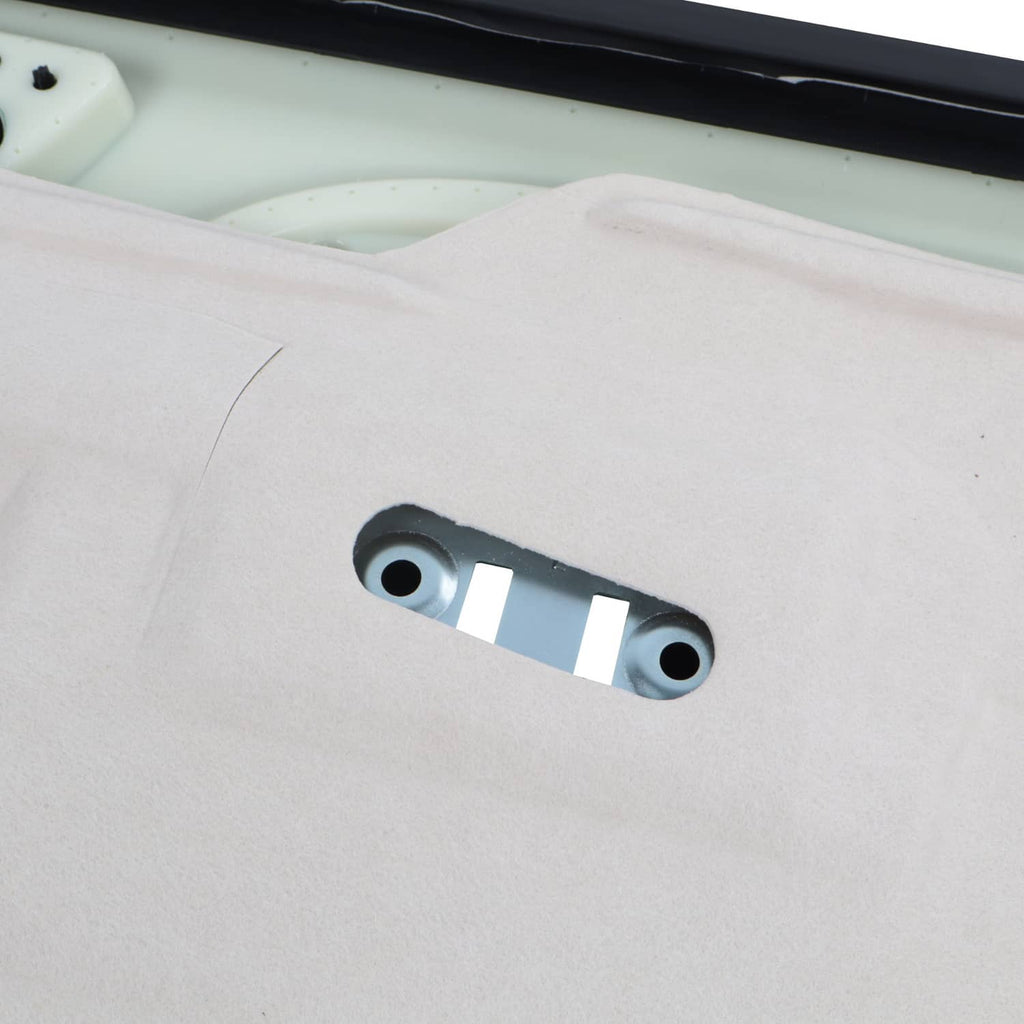 Door trim panel bracket tab with mounting holes on light inner backing.