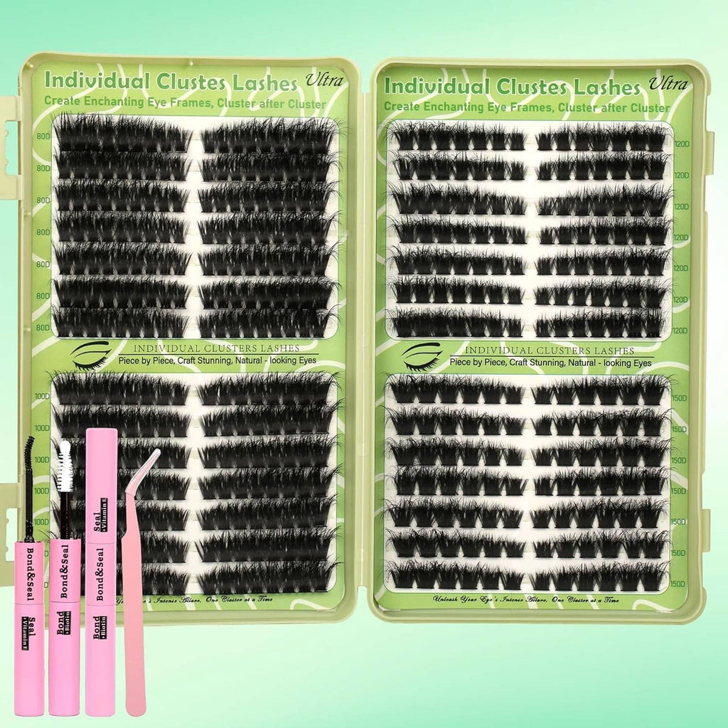 Black cat-eye wispy lash clusters kit with stacked individual cluster strips and pink tools