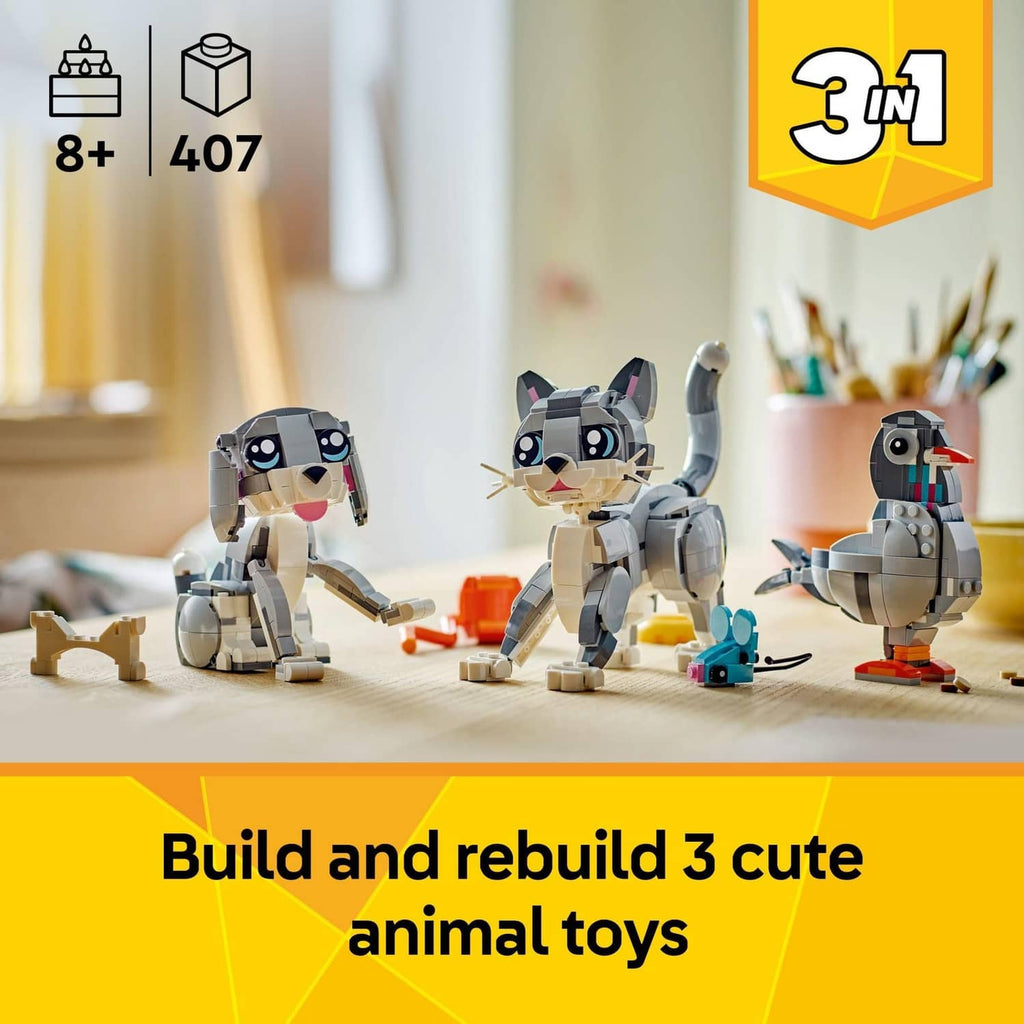 Built LEGO grey cat figure with orange accessory, plus other animal models on display