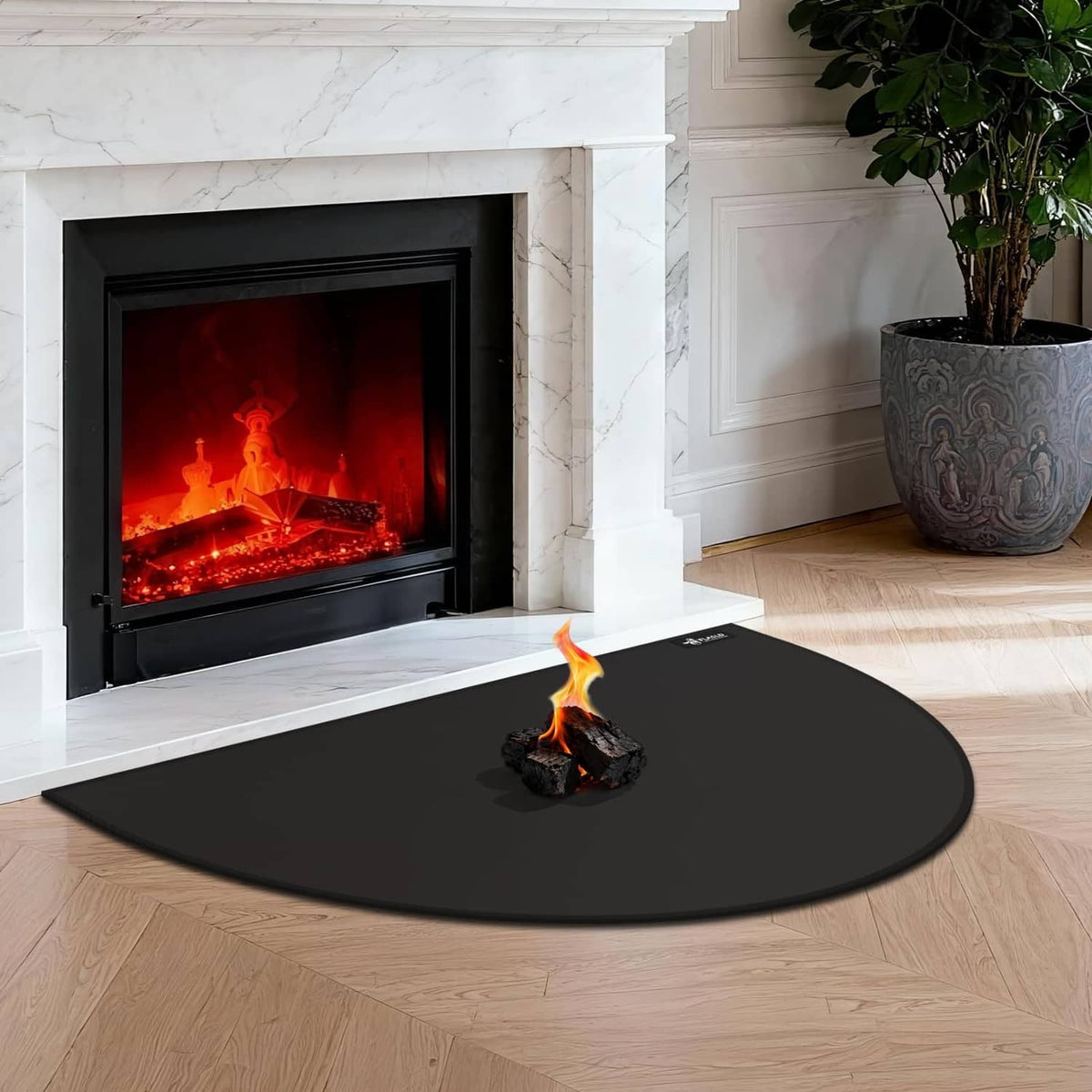 Black half-round fireplace hearth mat placed in front of a burning firebox