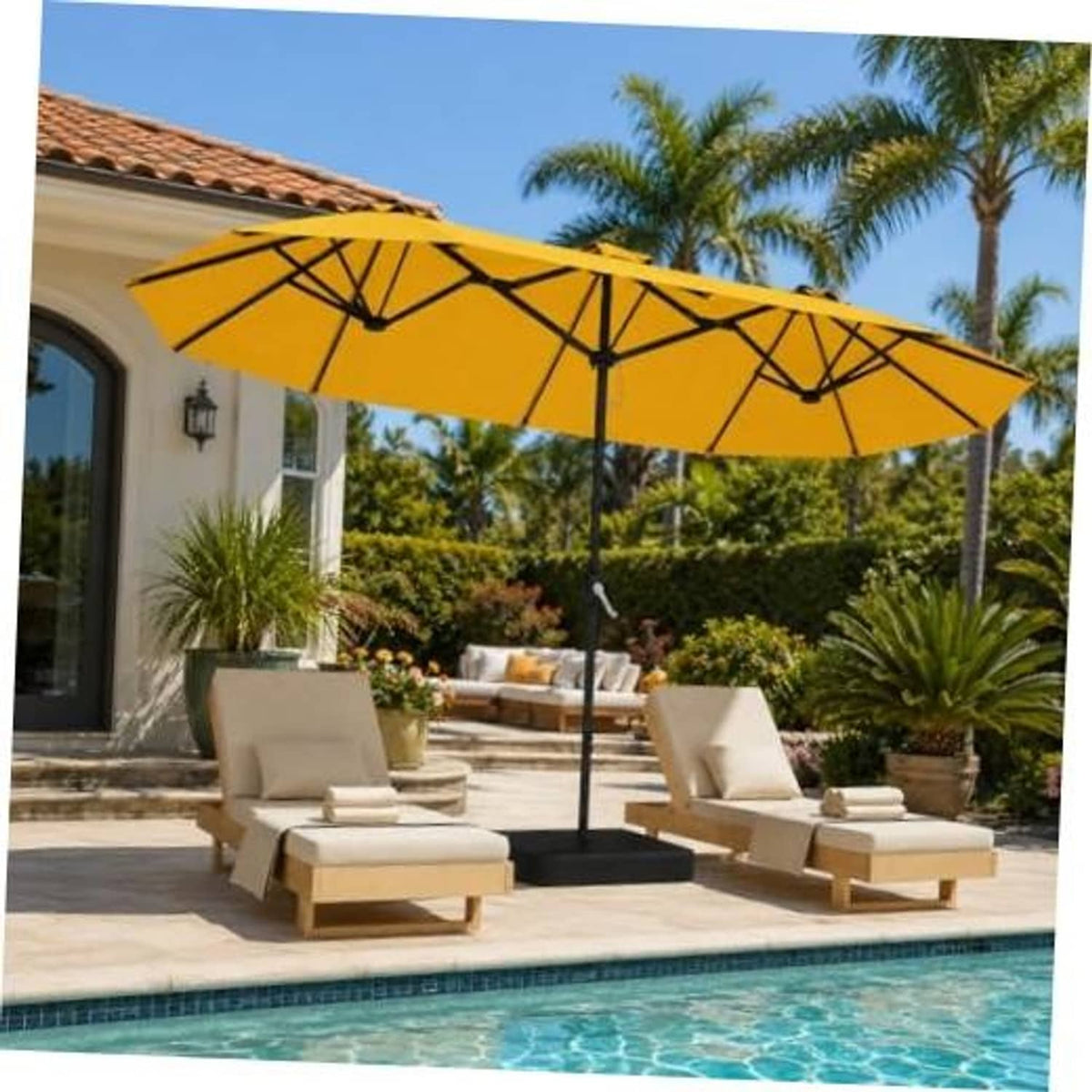 Large golden yellow patio umbrella with dual canopy and black center support pole