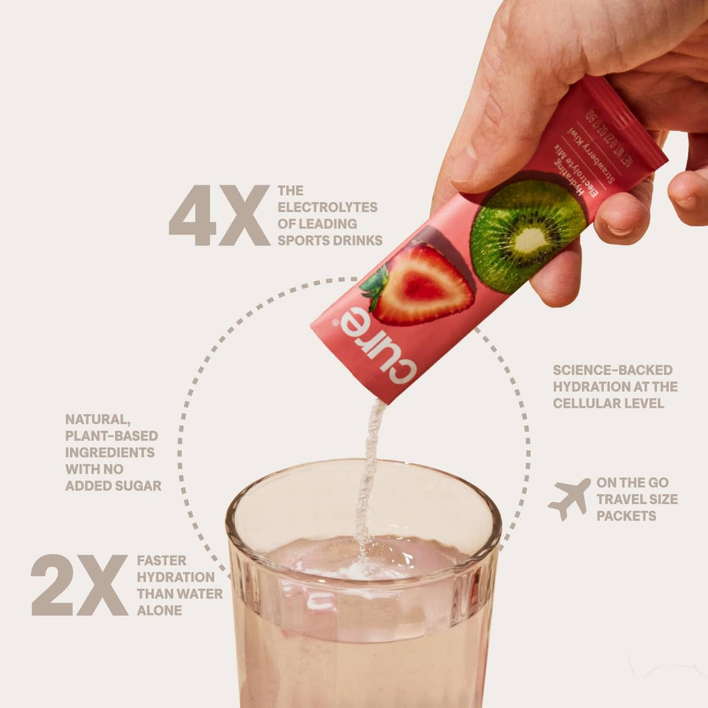 Red electrolyte drink sachet being poured into a glass with kiwi and fruit imagery