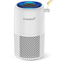 White cylindrical air purifier with blue top grille and circular control panel