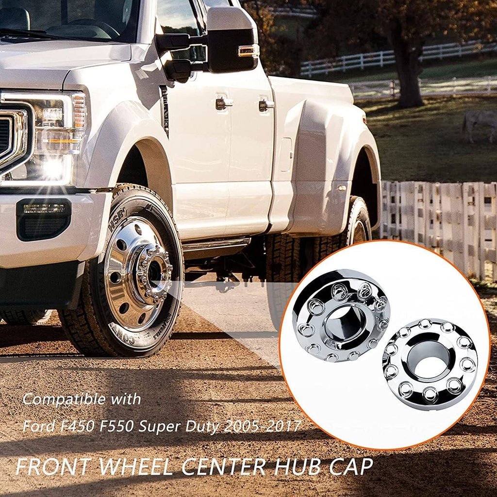 Chrome front wheel hub center caps installed on a heavy-duty truck wheel
