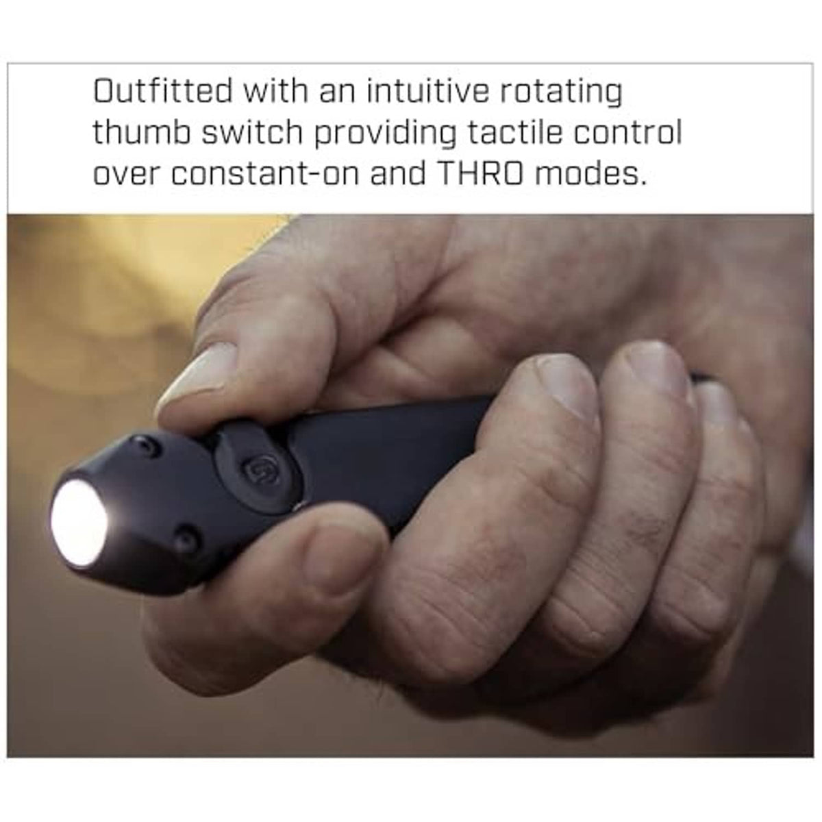 Handheld wedge flashlight in a hand, showing the round front light window