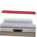 Third brake light assembly with long red LED lens and black mounting housing