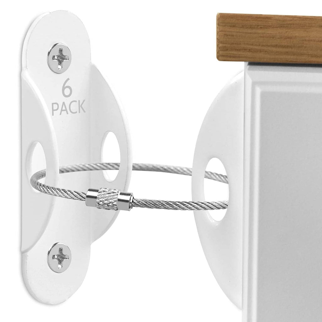 Close-up of white furniture anchor brackets with braided steel cable and screws
