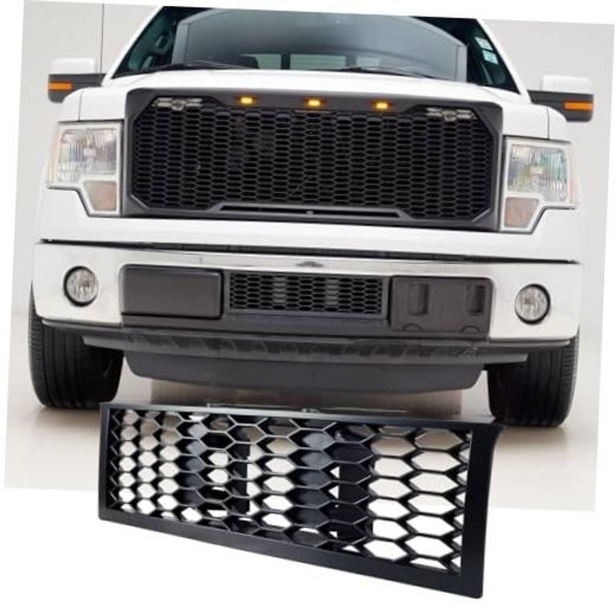Front bumper lower mesh grille insert with black honeycomb hex pattern, rectangular frame