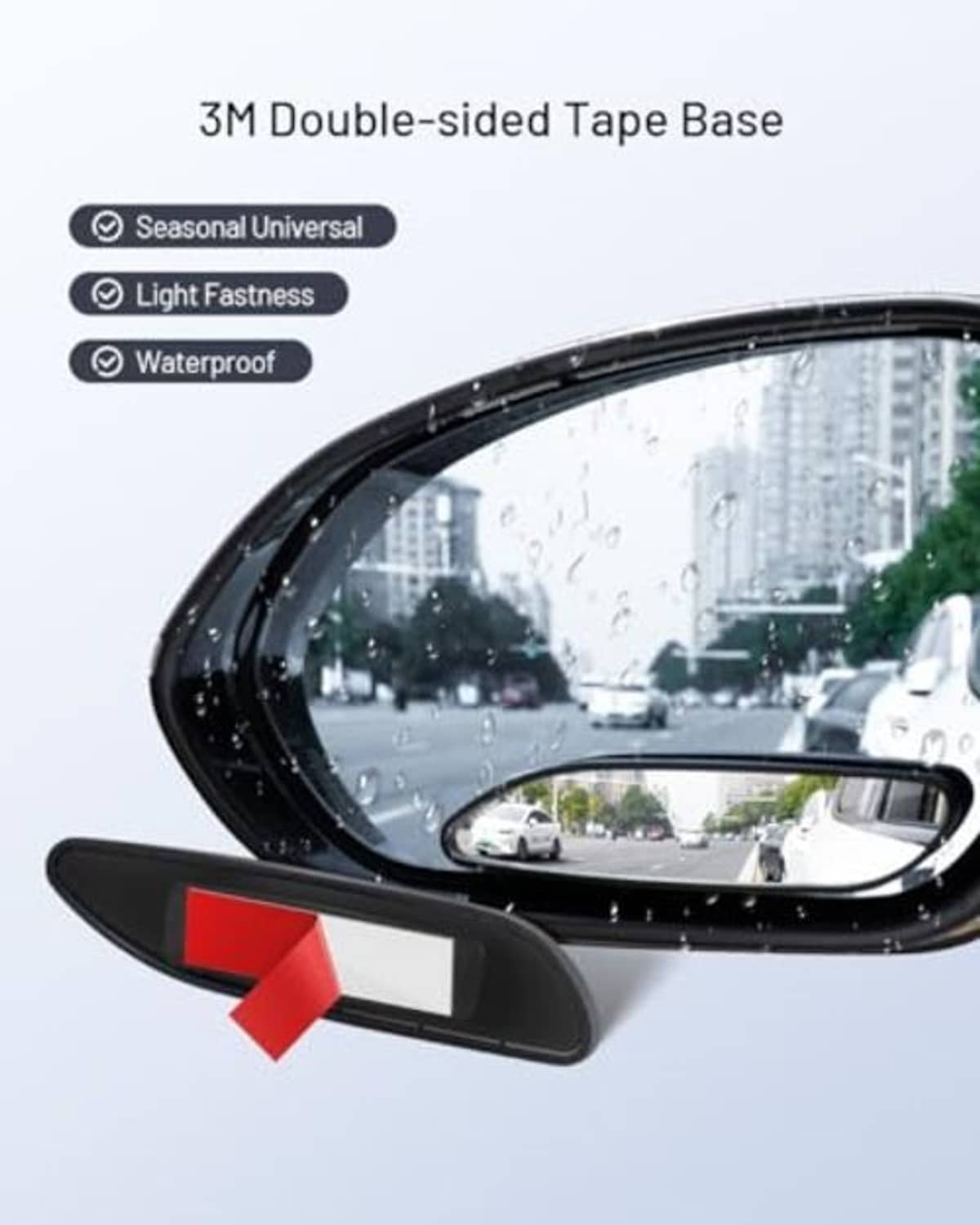 Black oval blind spot mirror with double-sided tape base and red alignment arrow.