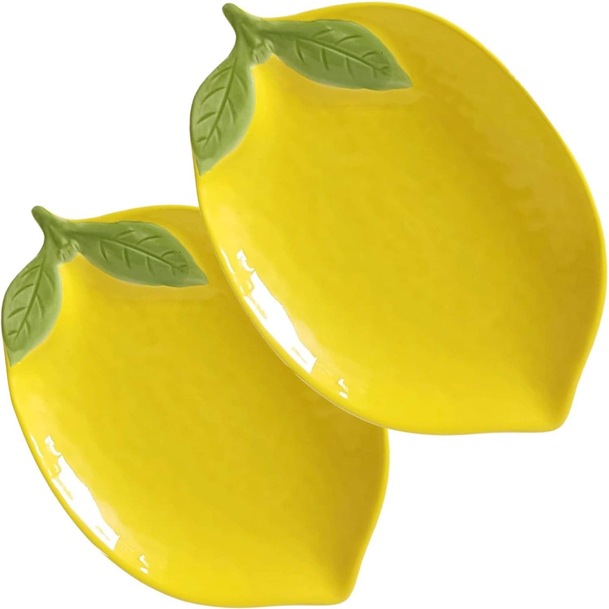 Set of two yellow ceramic lemon-shaped spoon rests with green leaf accents