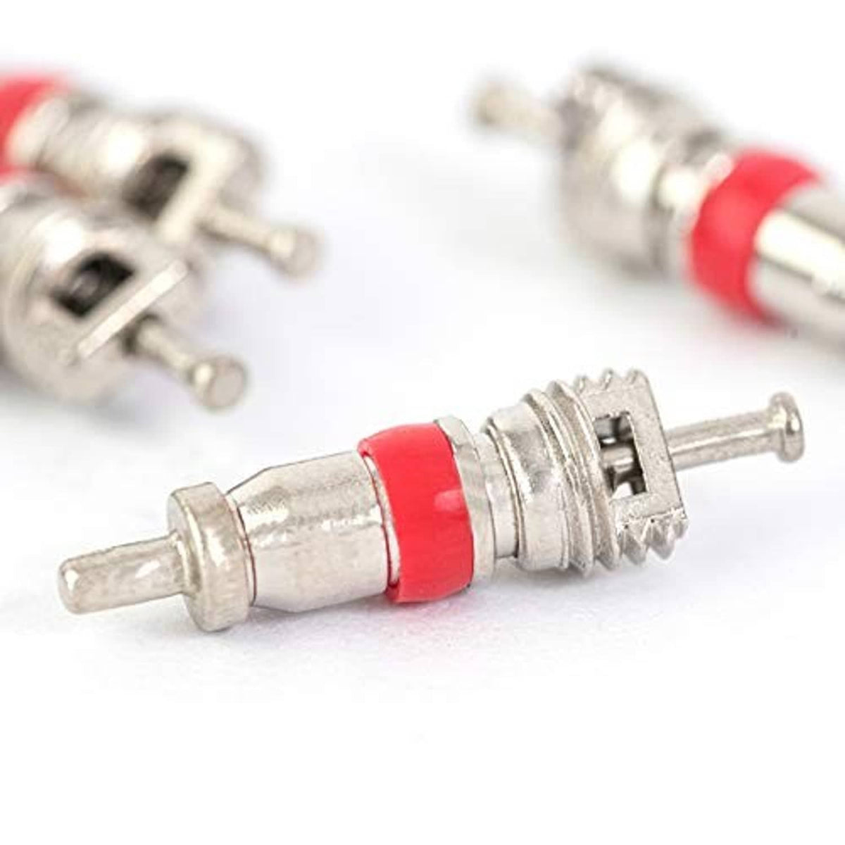 Single tire valve core with red seal ring and silver threaded metal body