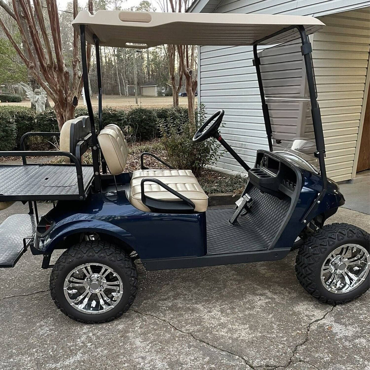Installed golf cart seat armrest/hip restraint on blue utility cart, black set