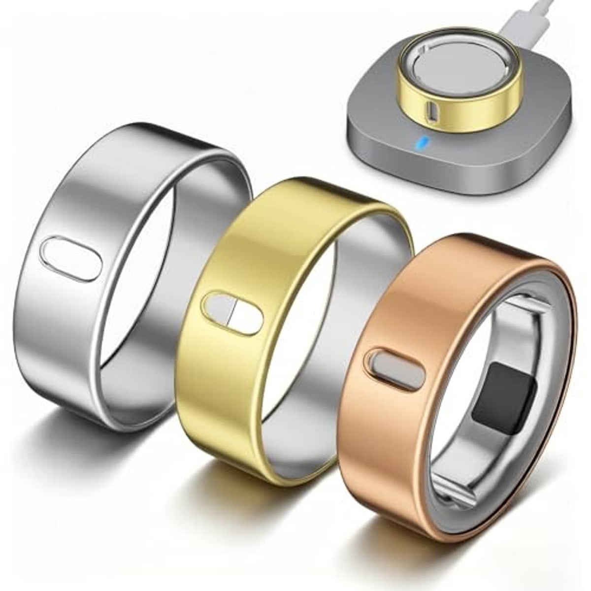 Smart ring cover trio with charging dock base: silver, gold, and rose-gold bands