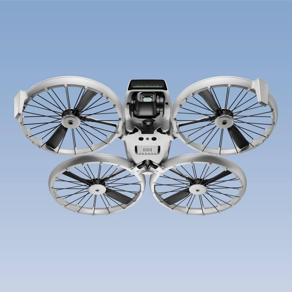DJI Flip drone with four white propellers installed, replacement blade assembly