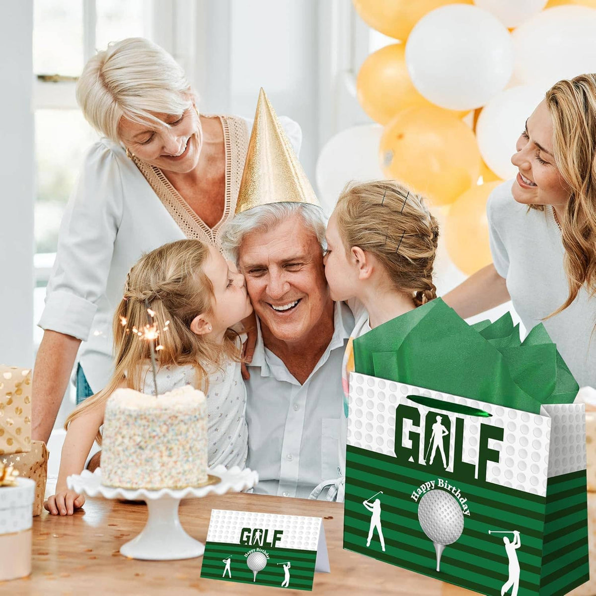 Green golf birthday gift bag with balloon and golfer silhouettes, held near party cake