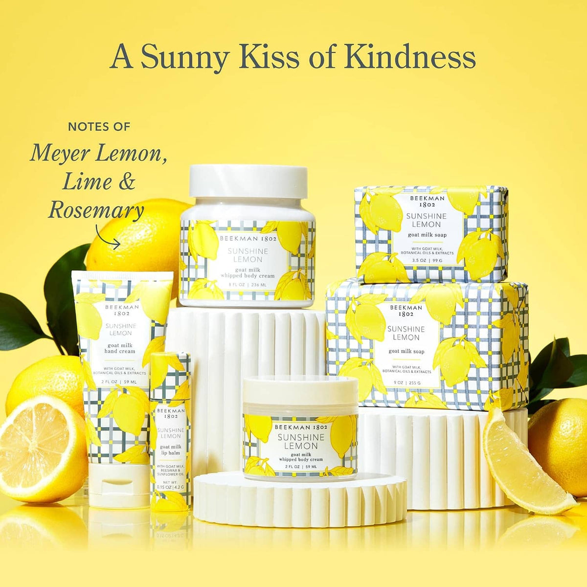 Sunshine Lemon whipped body cream with matching bar soap and jars arranged in a set