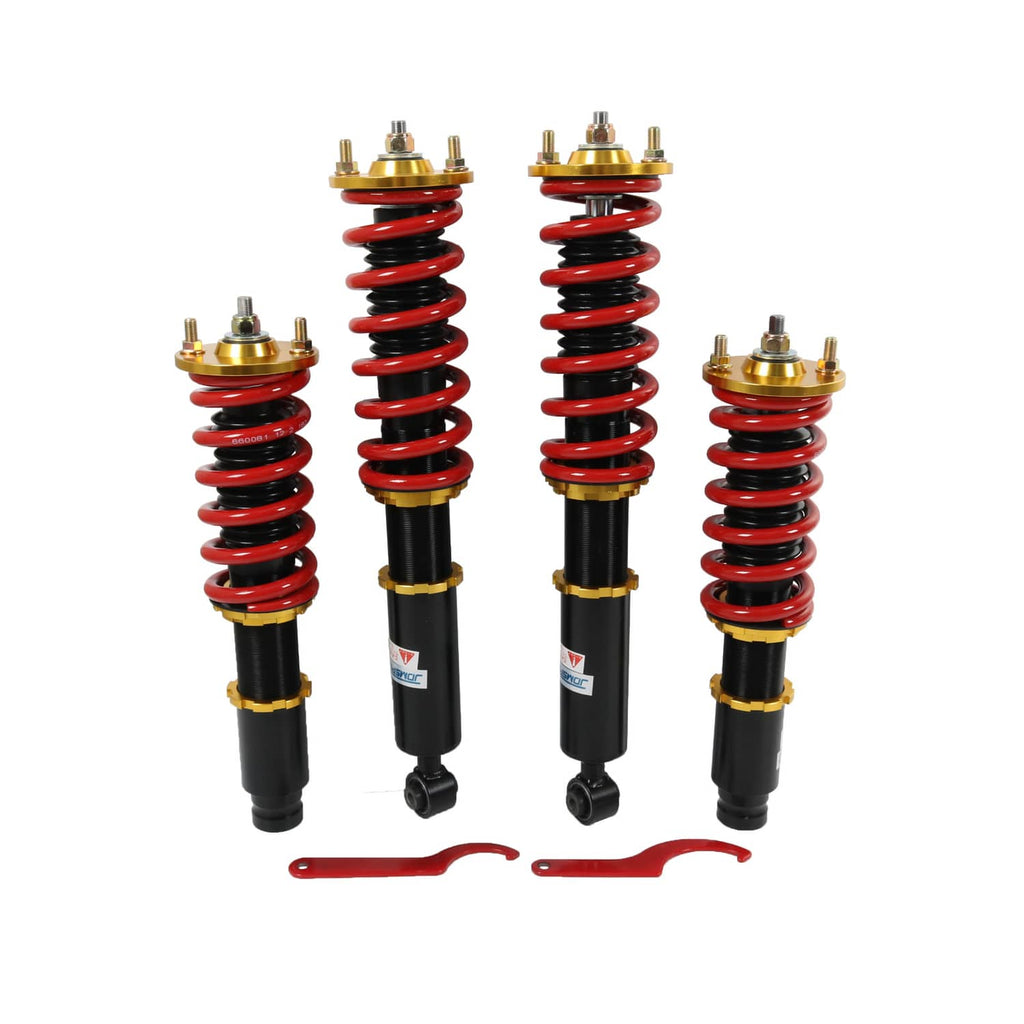 Four-piece coilover shock absorber set with red coil springs and gold top mounts