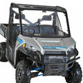 Clear windshield with black frame installed on a UTV front cab