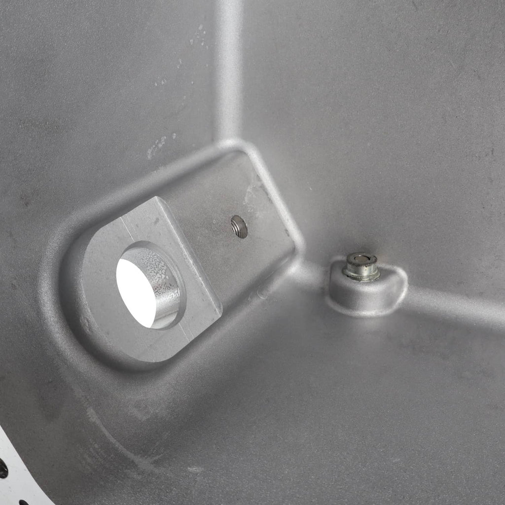 Oil pan interior with circular mounting hole and small pin boss