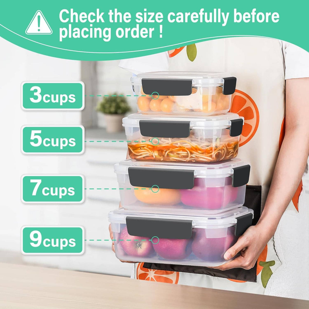Hand holding nested stack of clear plastic food containers with black latch lids
