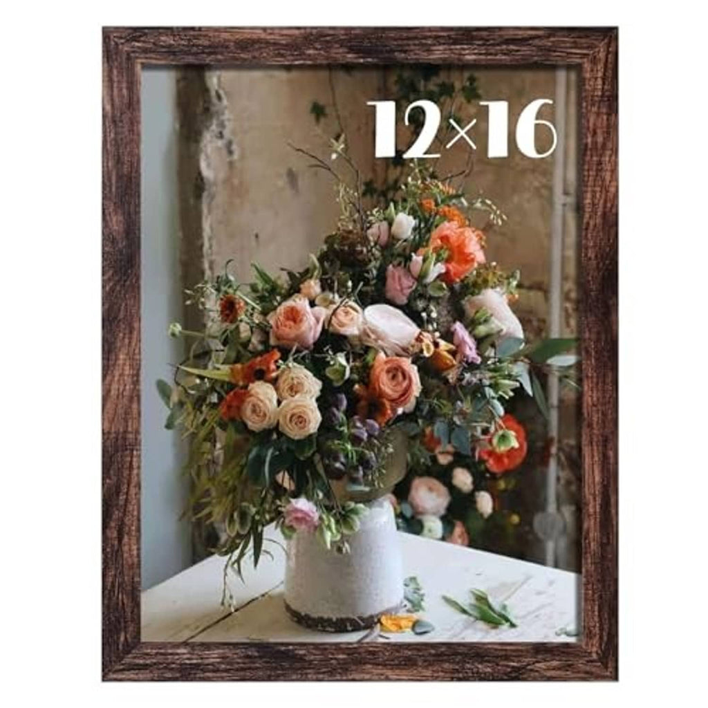 Brown 12x16 wall picture frame with flower arrangement in white vase