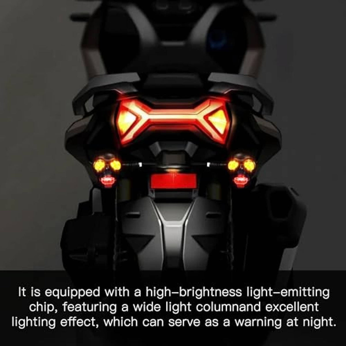 Motorcycle front with glowing skull-style LED warning lights in red and amber