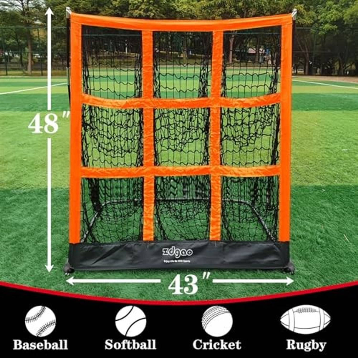 Orange 9-hole pitching net with black base on outdoor grass, front view