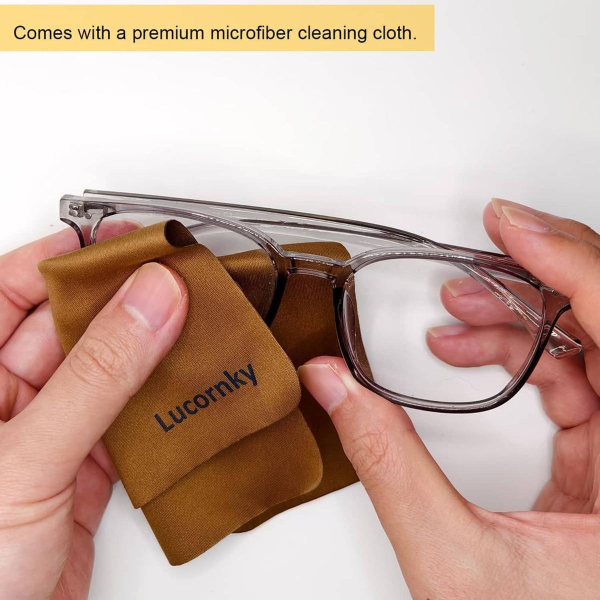 Black glasses pouch being slipped over a pair of eyeglasses