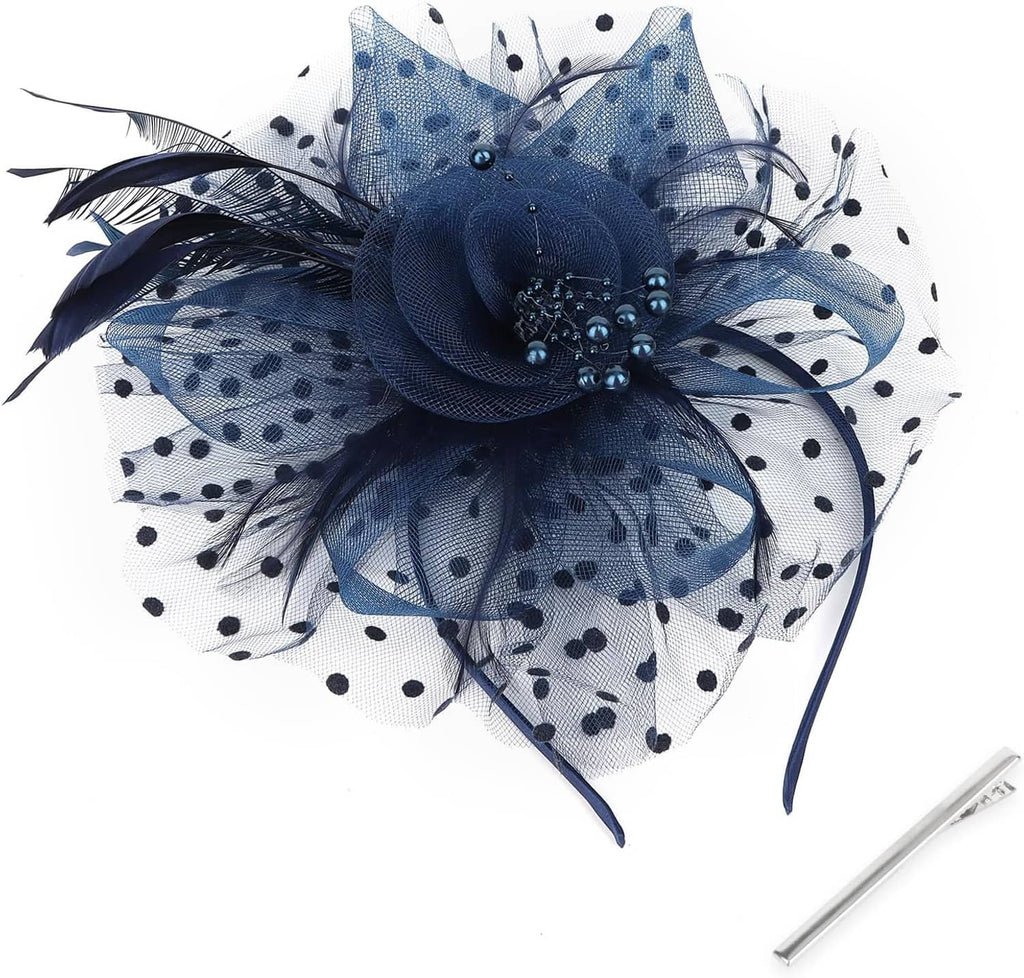 Navy polka-dot tulle fascinator with feather flower, faux pearls, and headband