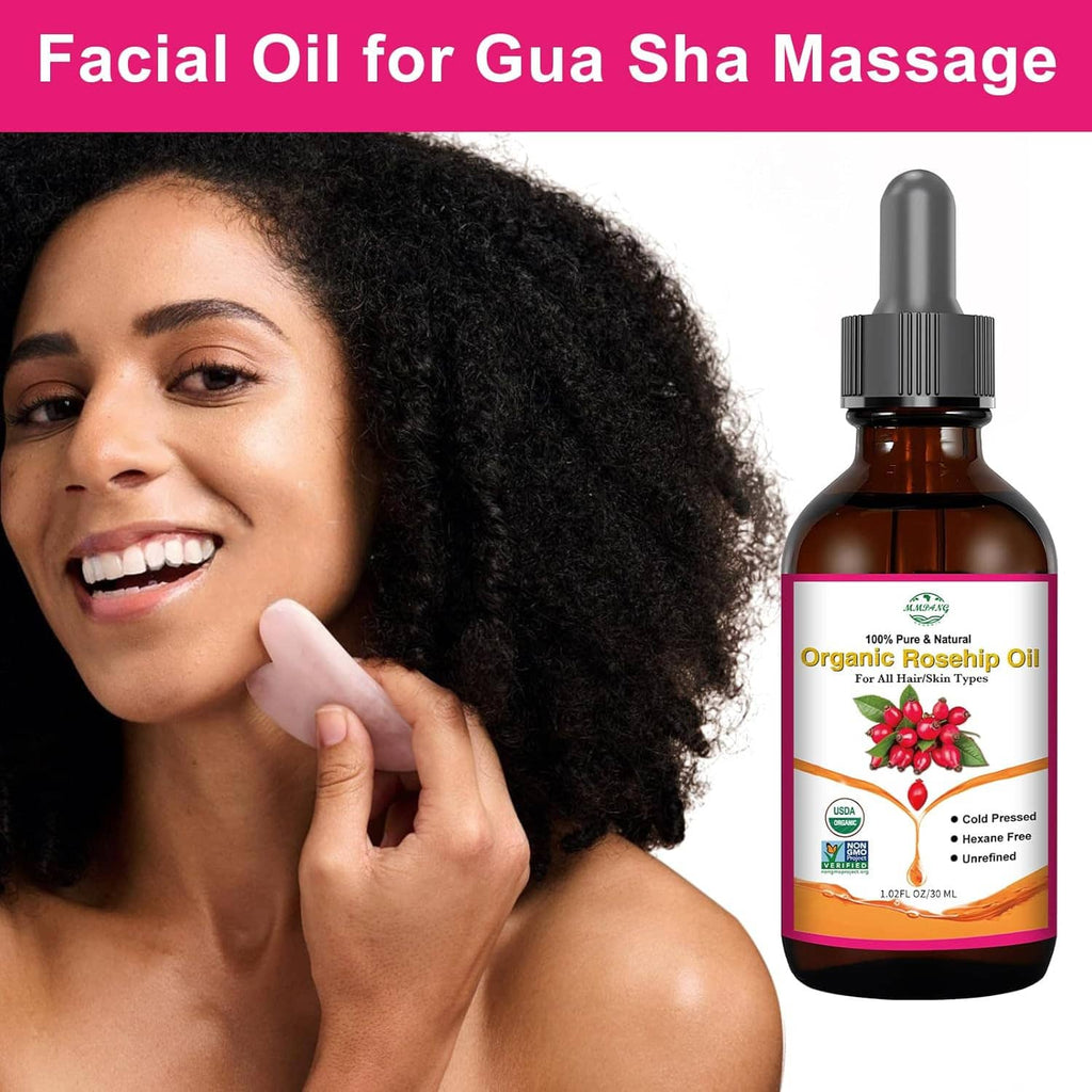 Woman holding a facial dropper with rosehip seed oil beside the bottle