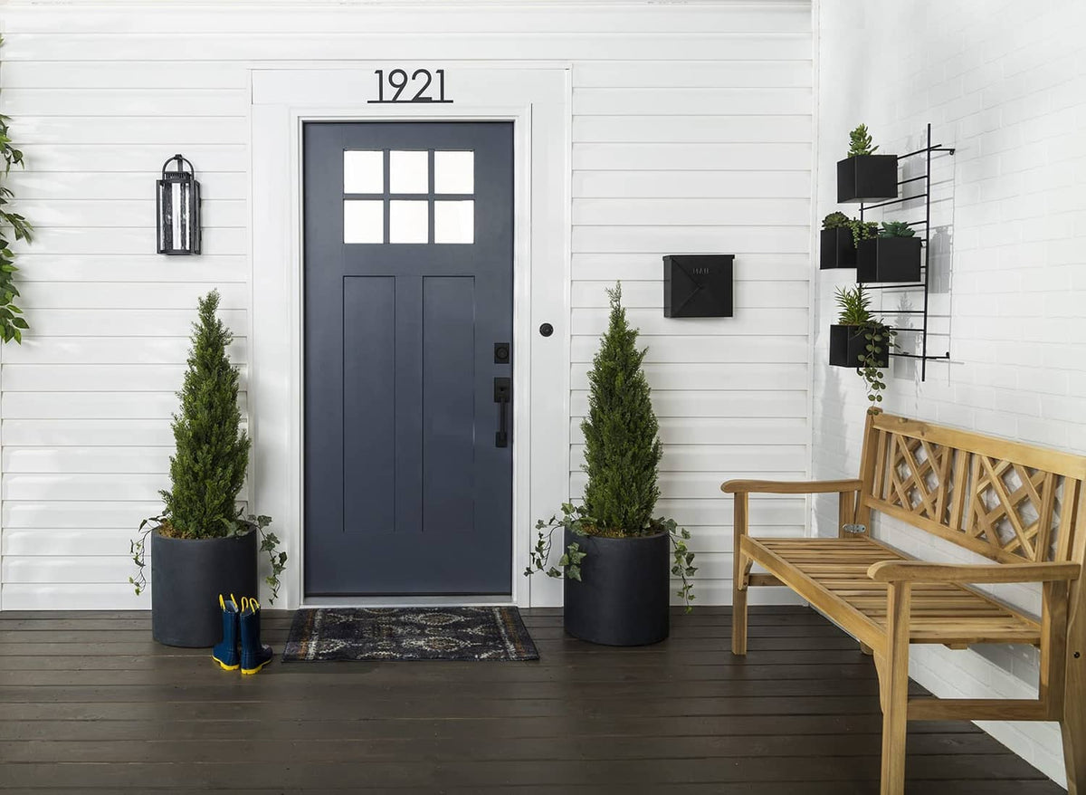 Dark navy front door with satin finish on a residential entry