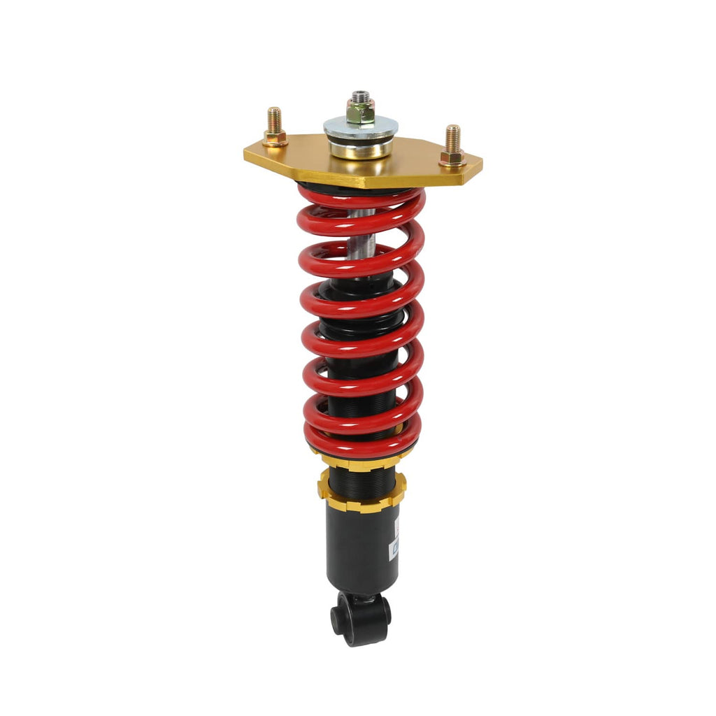 Coilover shock absorber with red spring, gold top plate, black damper body