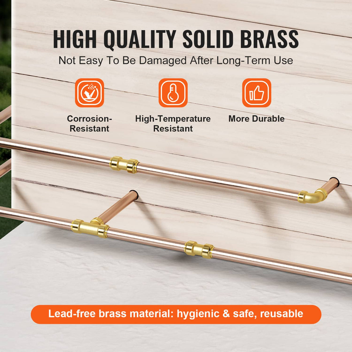 Gold brass push-fit elbows connecting copper tubes