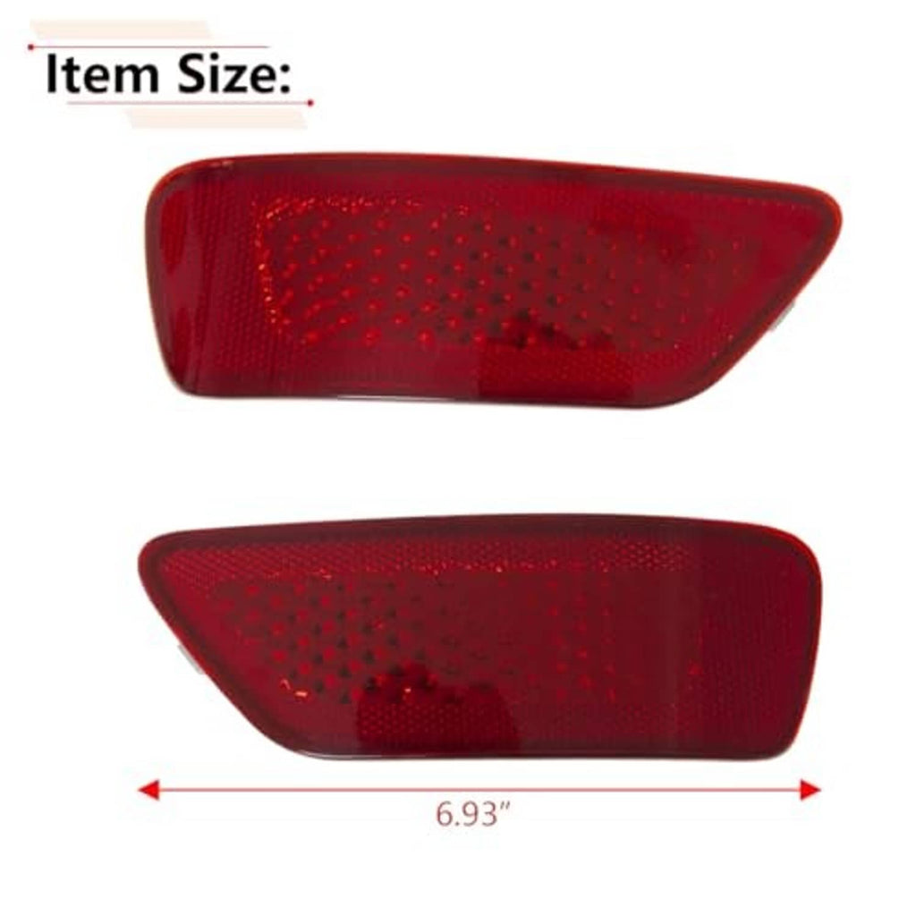 Two red rear bumper reflector lenses with dotted honeycomb pattern