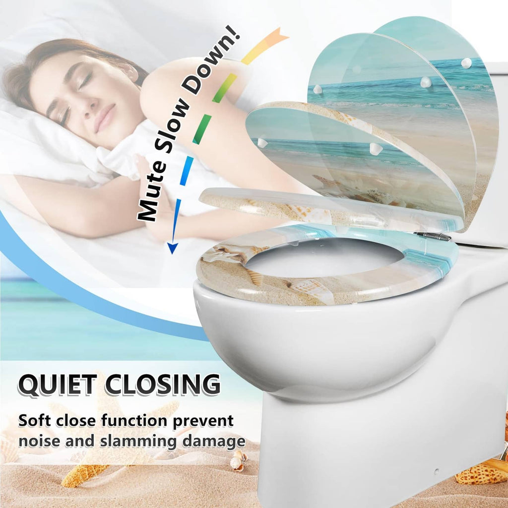 Round toilet seat with beach ocean graphic and slow-close style on white toilet