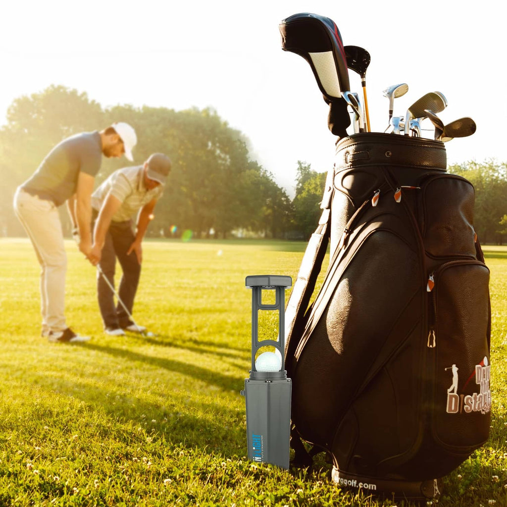 Grey/blue portable Clean Flight golf ball washer attached to a golf bag