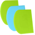 Dough scraper bench pads in green and blue, stacked