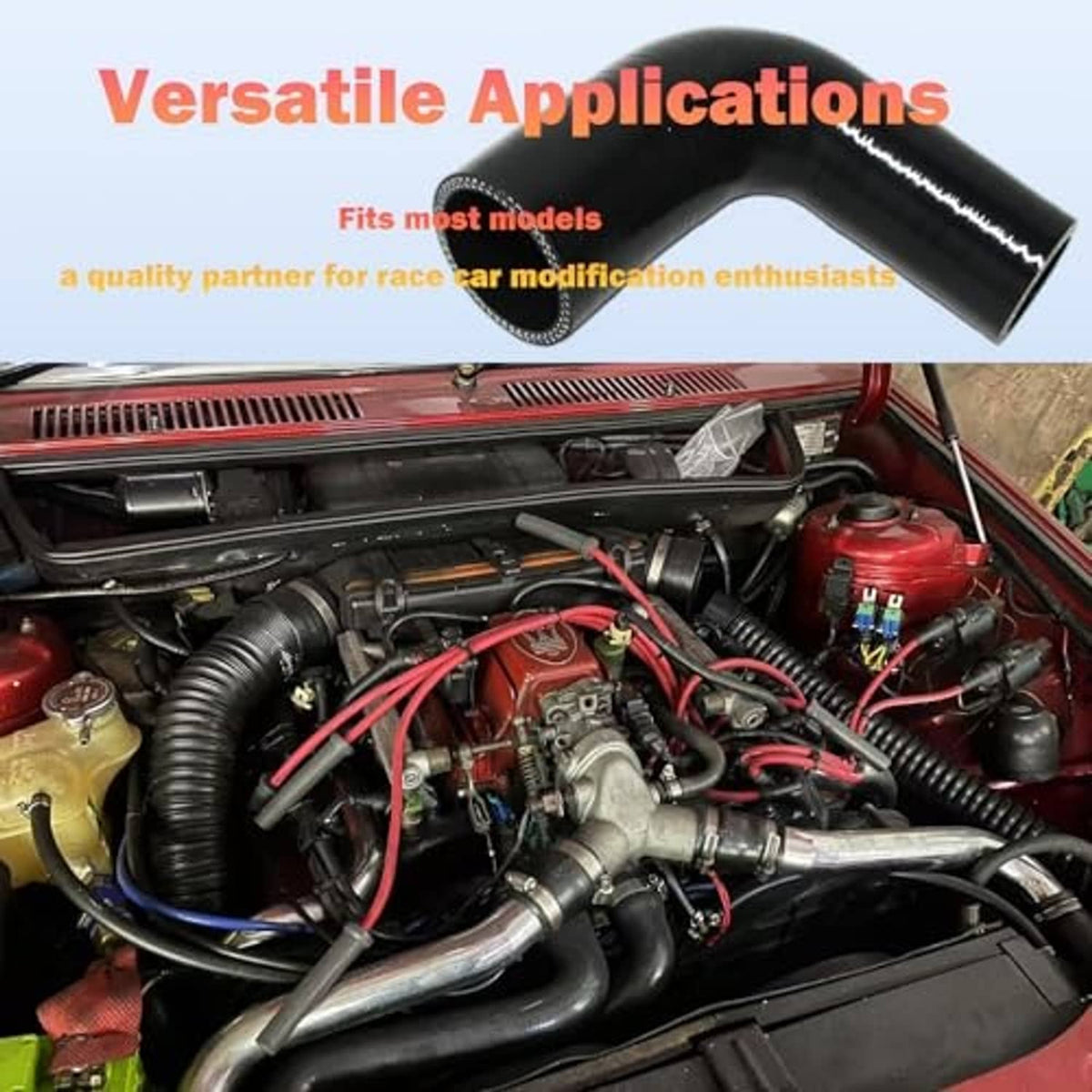 Black silicone 90-degree elbow reducer hose installed in an engine compartment