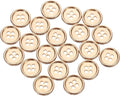 Set of round 4-hole metal sewing buttons, gold-tone, front view