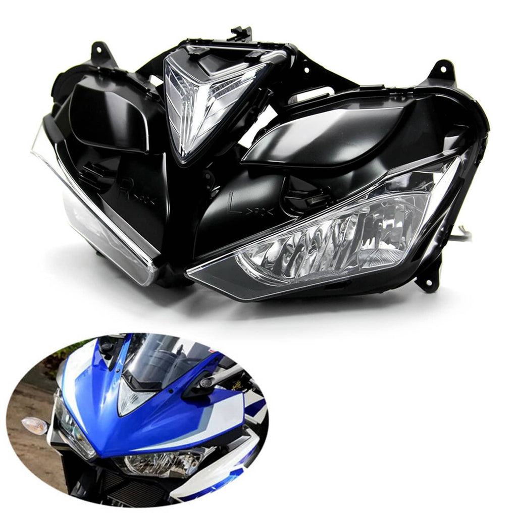 Clear-lens motorcycle headlight assembly with black housing, front studio view